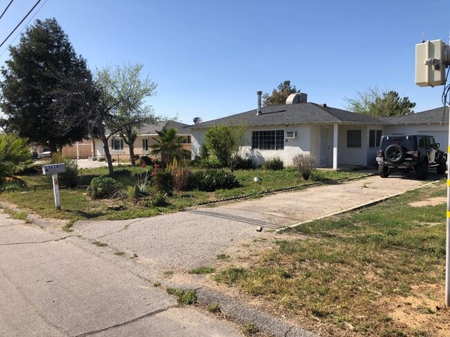 front yard of house and garage - 33634 Colorado St