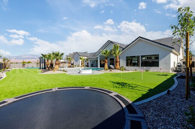 Building Photo - Gorgeous Custom Single Story with RV Garage