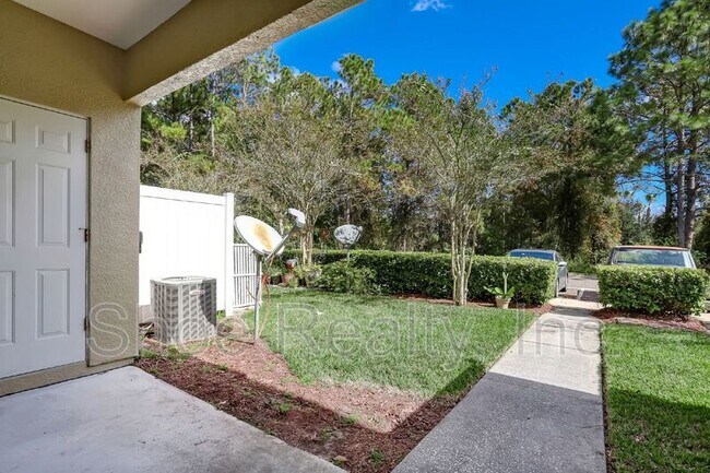 Building Photo - 4220 Plantation Oaks Blvd