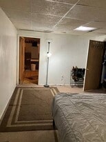 Bedroom into kitchenette w bthrm - 764 Lenore Ln