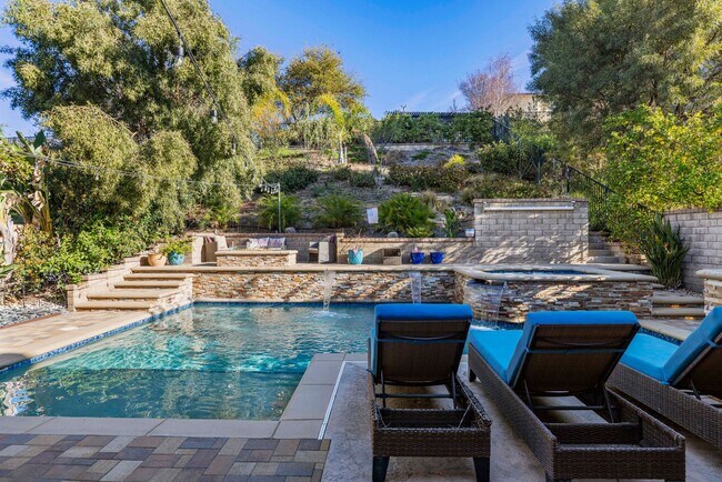 Building Photo - Luxurious 5-Bedroom Pool Home with Solar &...