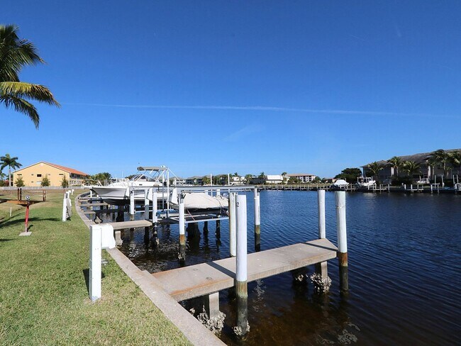 Building Photo - BEAUTIFUL 3-BEDROOM  WATERFRONT CONDO WITH BOAT SLIP AND HEATED POOL