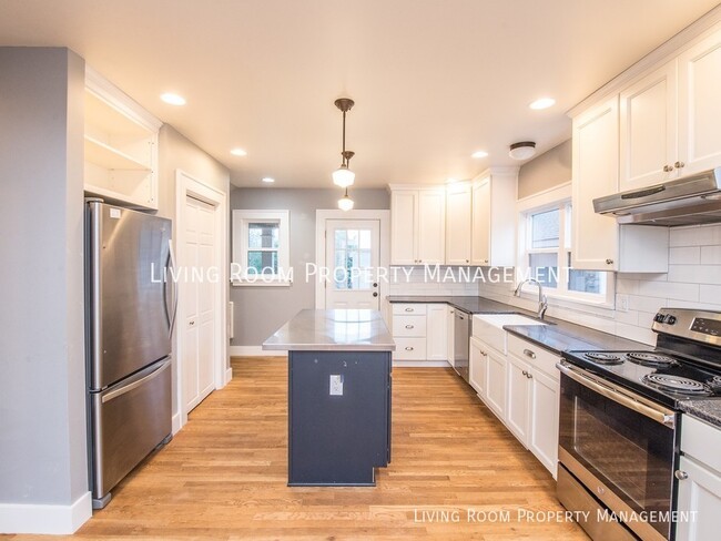 Building Photo - 1926 Fully Remodeled Farmhouse with a Fenc...