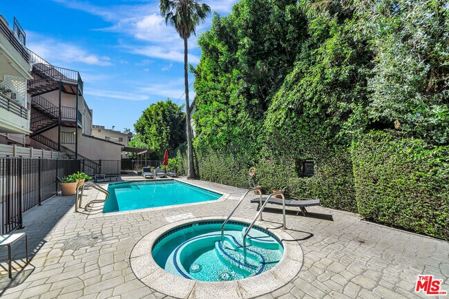 Building Photo - 4477 Woodman Ave