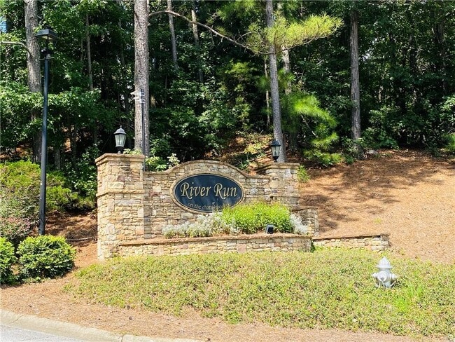 Building Photo - 4090 Riversong Dr NW