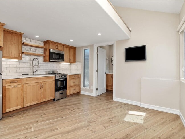 Building Photo - Studio with Loft, Private Patio, and All U...