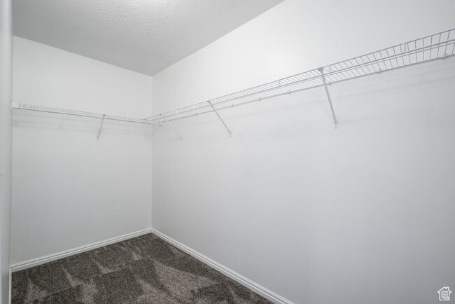 Building Photo - Spacious 3-bedroom top level condo is a mu...