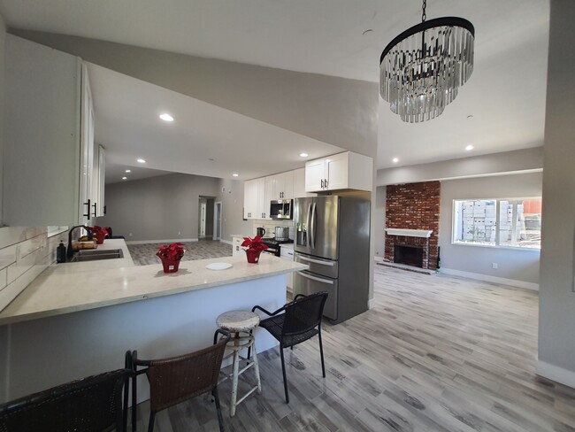 View of Living room & Kitchen from dining room - 11261 Berry St