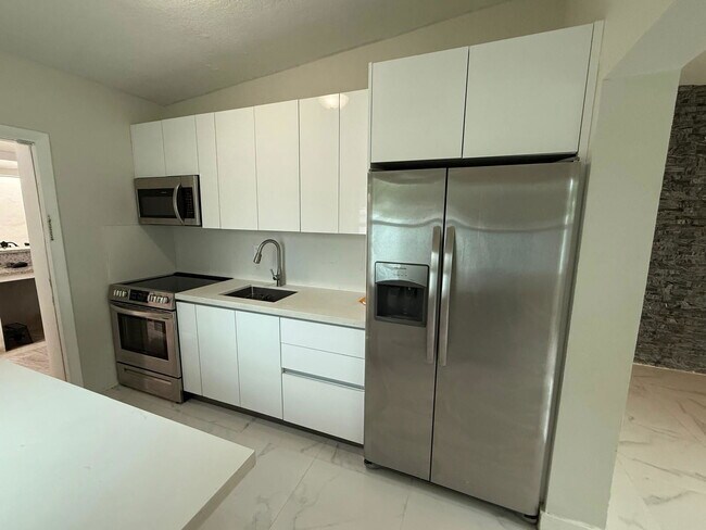 Building Photo - 1295 NW 122nd St