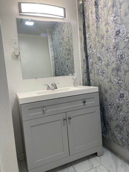 New vanity, mirror, & light - 719 East Fremont Street
