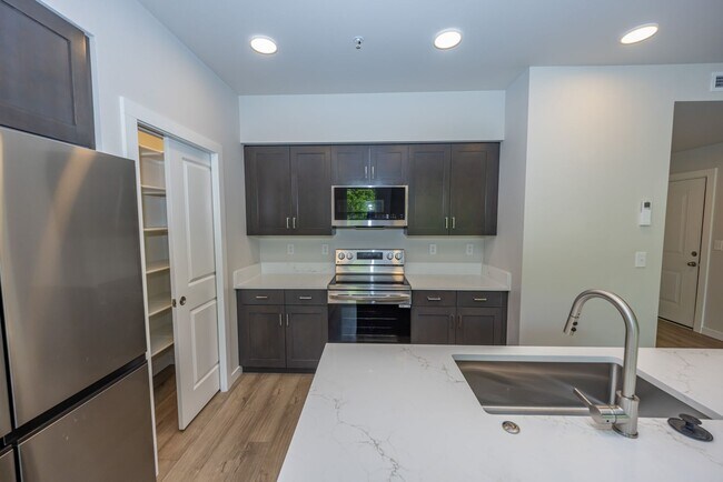 Building Photo - Brand New! - 2 Bedr in Gated Community - Free xfinity Internet