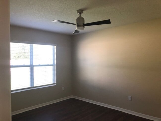 Building Photo - 4/2 with great FENCED in yard and upgraded!