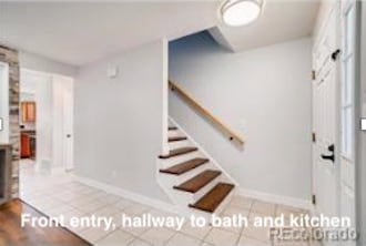 Front entry hall, stairs to 2nd level - 7152 E Briarwood Cir