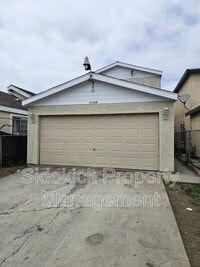 Building Photo - 10739 Mona Blvd