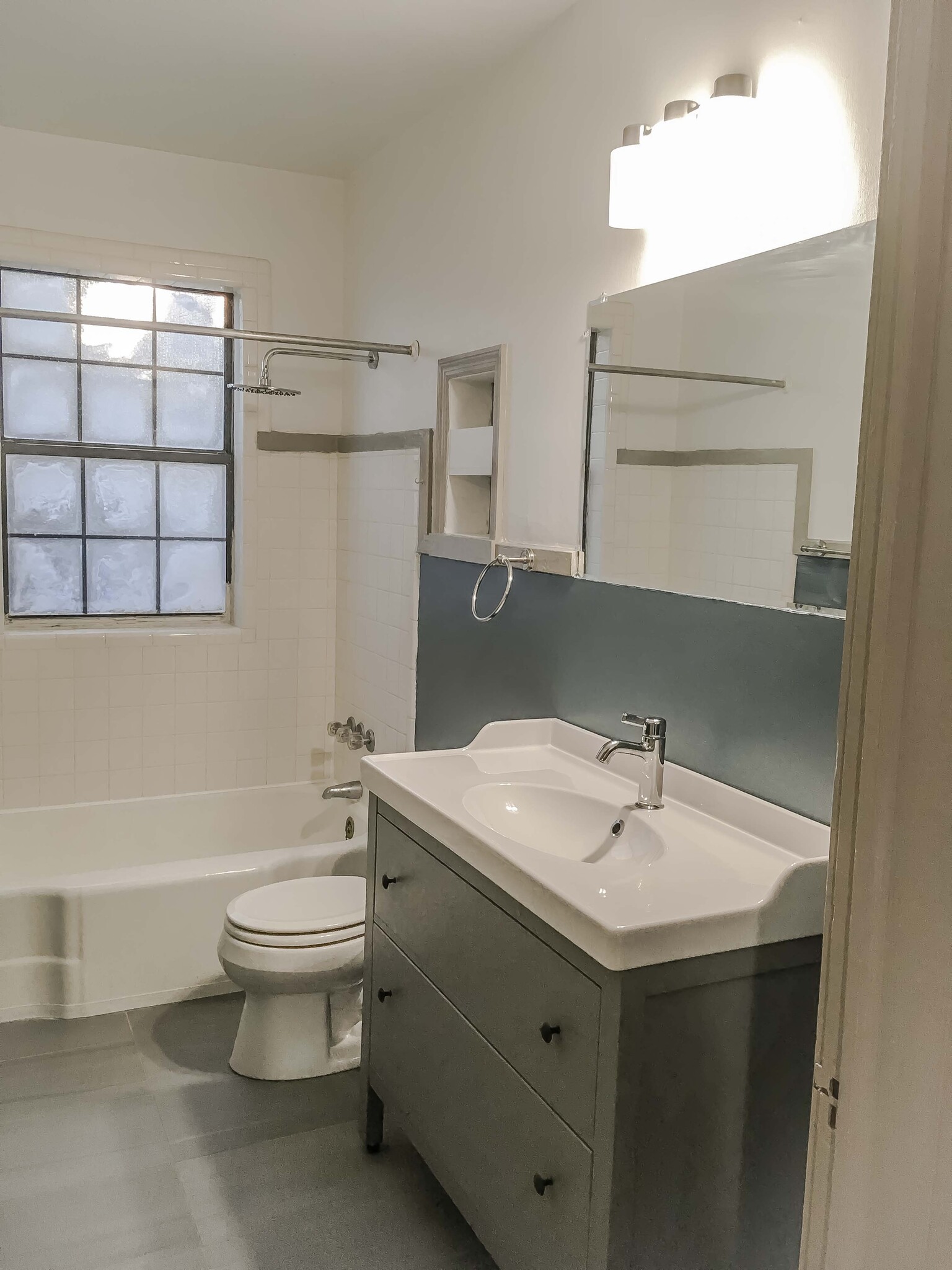 Master bathroom with new tile and vanity. - 527 McDaniel St