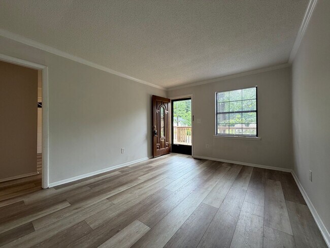 Building Photo - Large 4/2 with finished basement/bonus room- $1,895