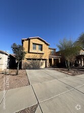 Building Photo - Cozy 4 bed / 2.5 bath with new carpet in p...