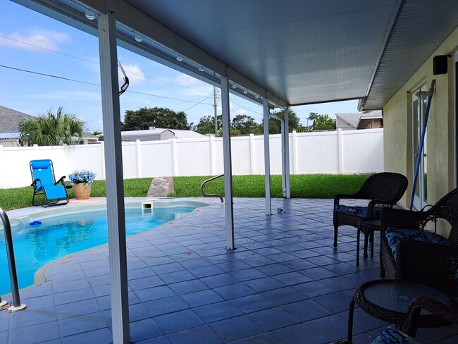 Building Photo - 3 BEDROOM POOL HOME OASIS IN FLORIDA SHORE...