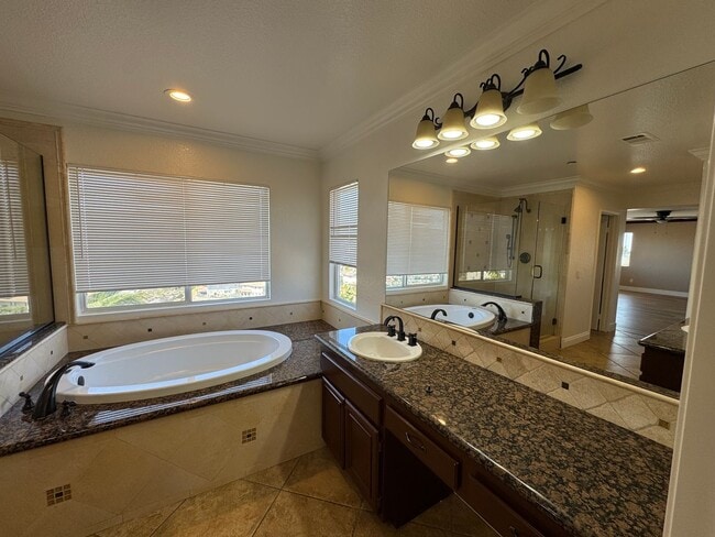 Building Photo - Gorgeous for 4 Bedroom and gated community