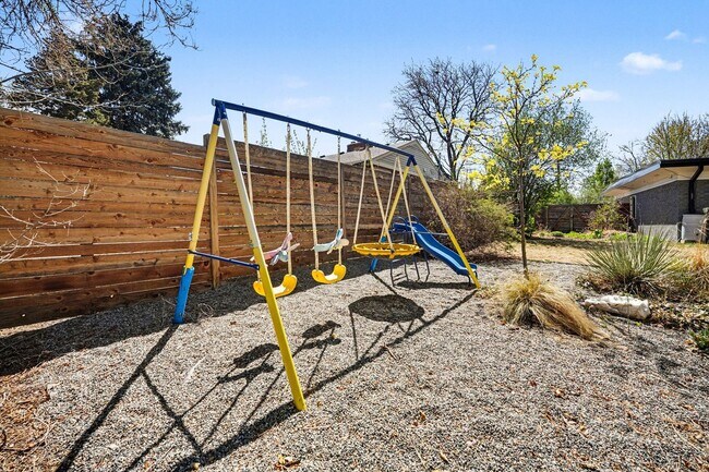 Building Photo - Sunlit Wheat Ridge Gem with Huge Wooded Backyard