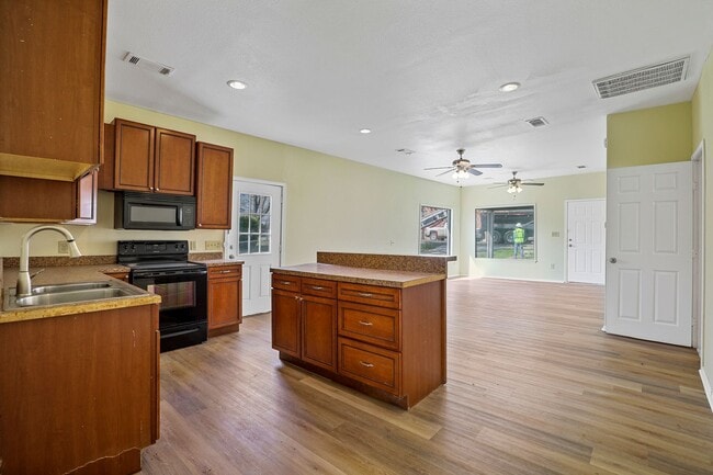 Building Photo - White picket fence cottage, ready to be your next home!