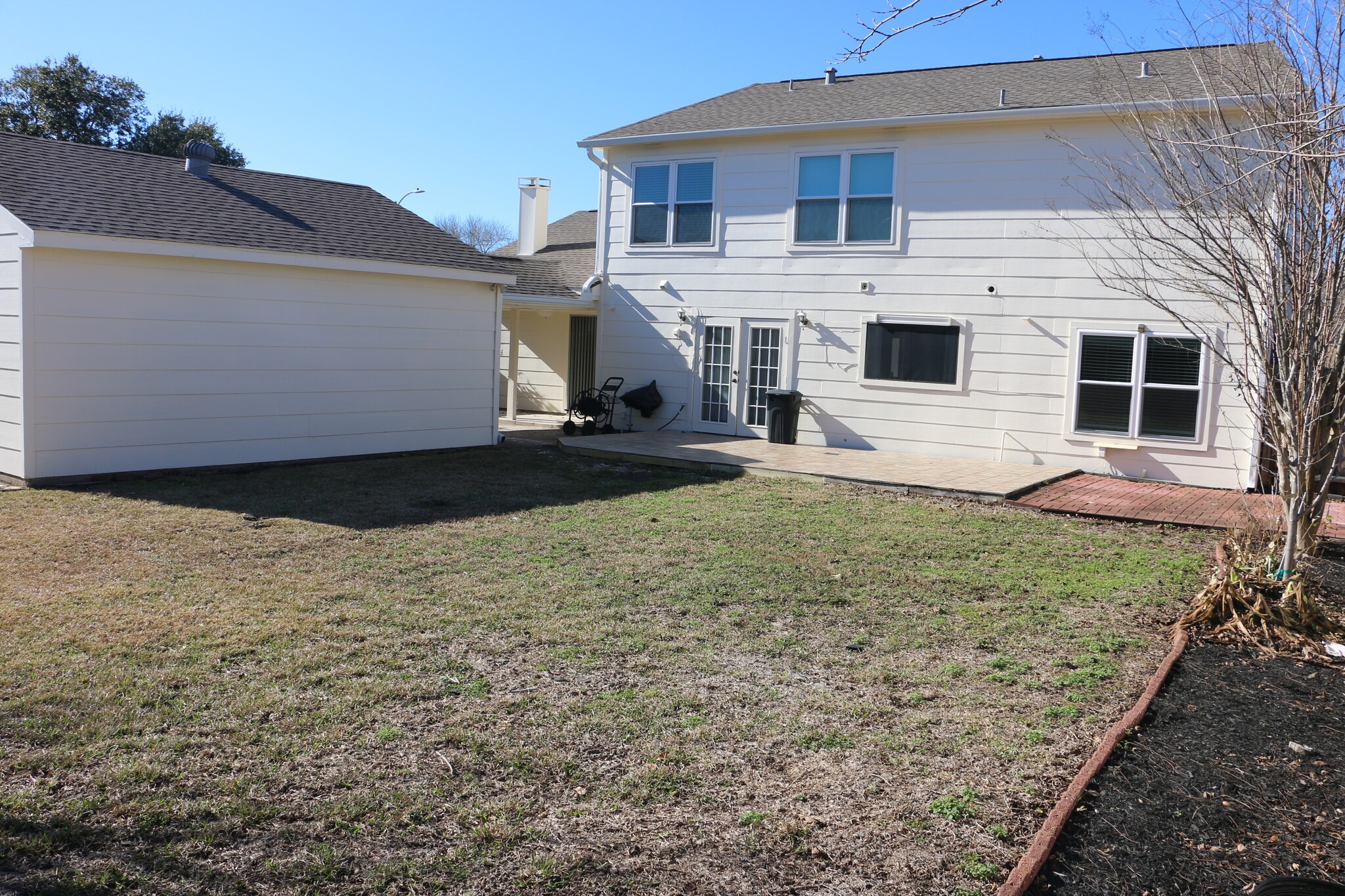 Back of Home with Garage on Left - 458 Woodrail Dr