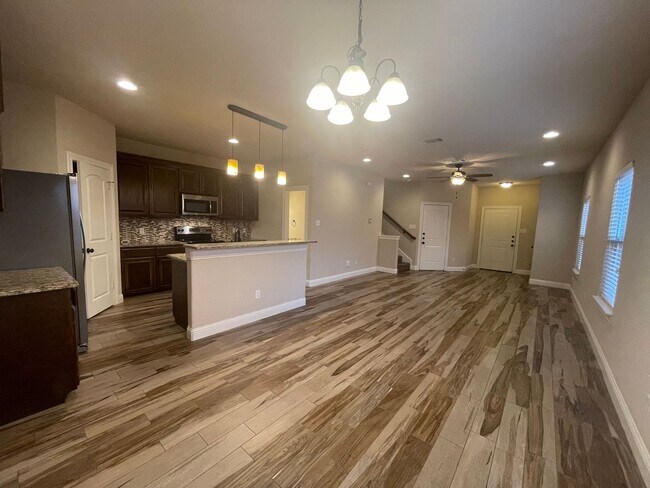 Building Photo - Beautiful Benbrook 3B/2.5B Townhome ((Stainless Steel Appliance Package)) Dazzling wood-like tile...
