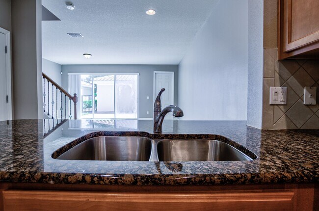 Building Photo - Beautiful 3/3 w/ 2 Car Garage in Gated Vil...