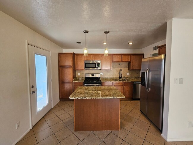 Building Photo - 3 bedroom with mother in law suite/ home o...