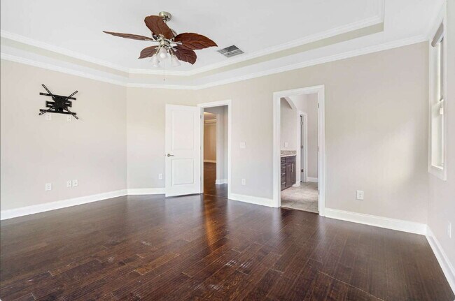 Building Photo - Luxurious 4-Bedroom Retreat with Third Floor Bonus Room & Fenced-in Backyard