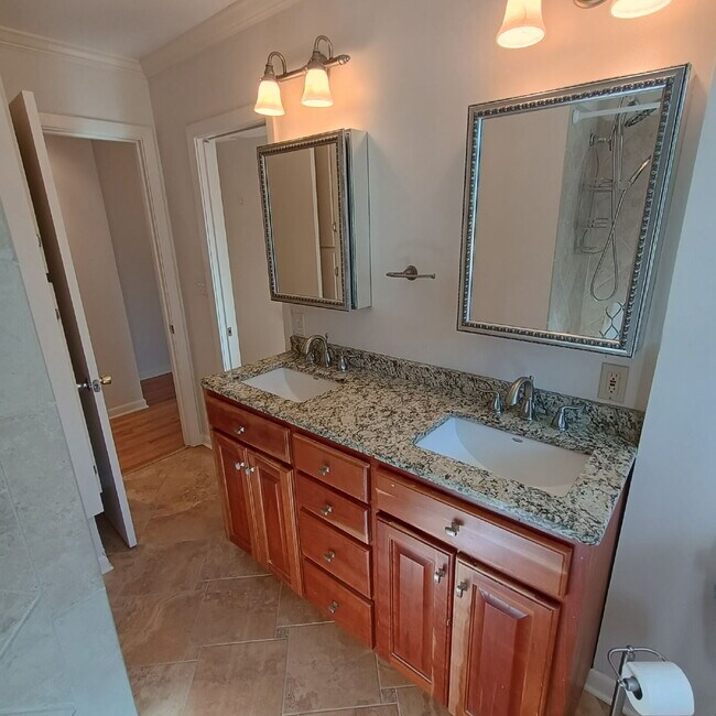 Building Photo - Modern Comforts with Granite & Hardwood Finishes!" 3 Bedroom 2 bath home.