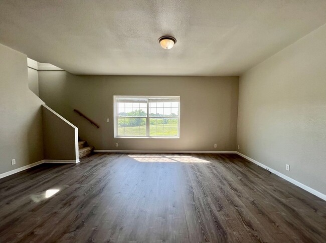 Building Photo - Fully Remodeled 3 Bedroom | 2.5 Bath Townhome – Great Location off K-18!