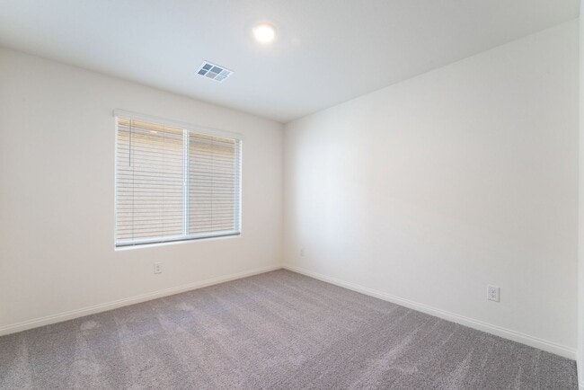 Building Photo - Brand-new 4-bedroom home located in the de...