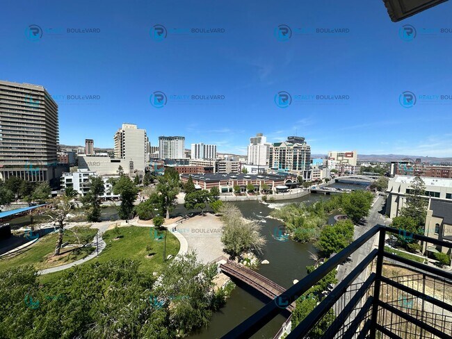 Building Photo - Exquisite 1-bedroom, 2-bathroom condo Overlooking the beautiful Truckee River with covered parking!