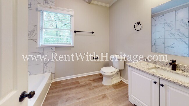 Building Photo - GORGEOUS BRICK RANCH WITH ALL THE UPGRADES...