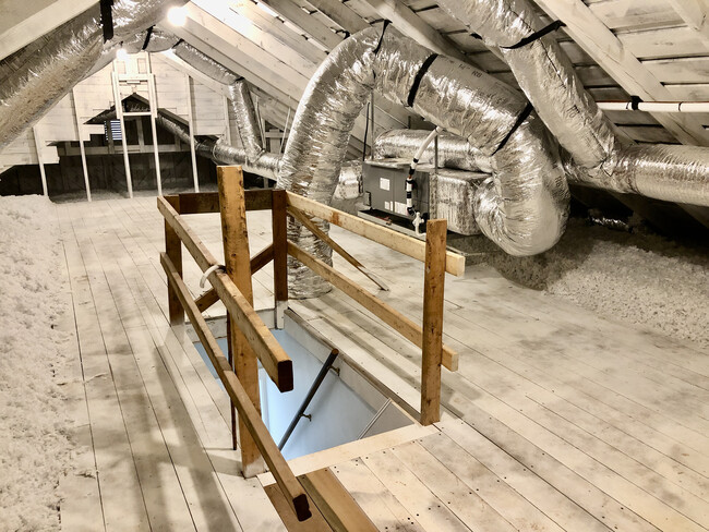 Floored attic with brand new insulation and HVAC. This is a fantastic storage area, easily accessible! - 2205 Mayflower Dr