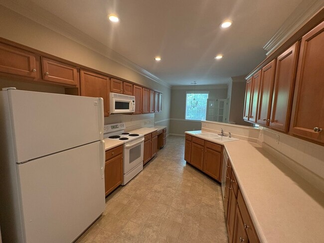 Building Photo - 3BR/2BA Condo with Sunroom & 2-Car Garage