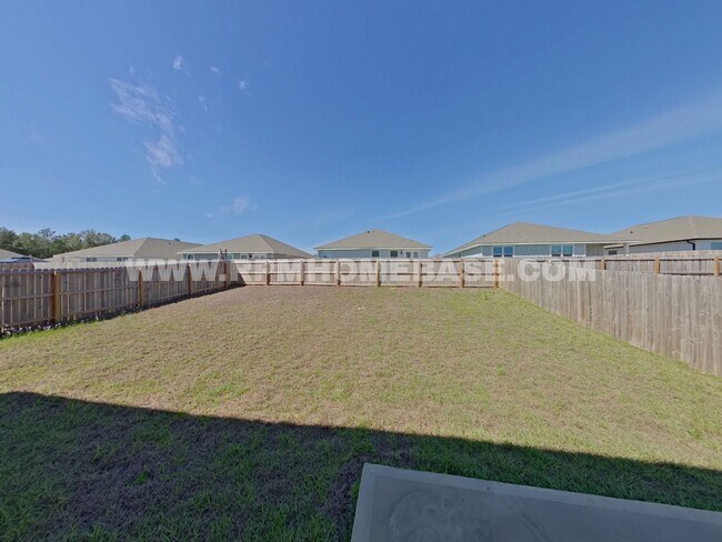 Building Photo - Spacious 5-Bedroom Home in Shoal River Community with Modern Features and Community Pool Access!