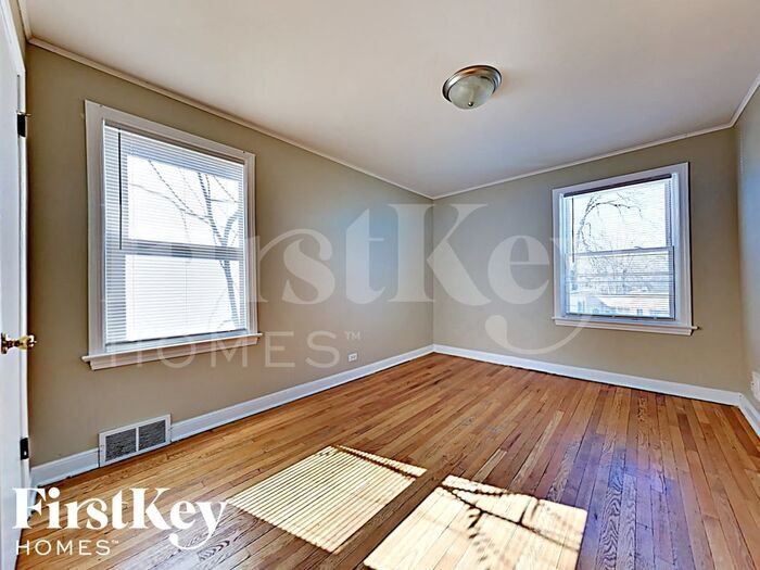 Building Photo - 1573 W 100th Pl