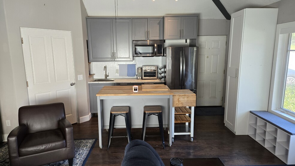 Kitchen with island - 10224 Aviary Dr