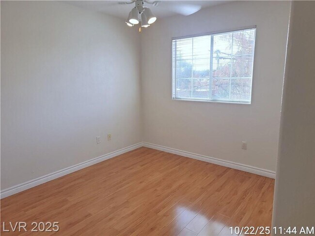 Building Photo - Inviting Green Valley Condo with Dual Balc...