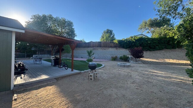 Building Photo - 4bed/2bath/2car garage. RV parking & massive landscaped backyard in cut-de-sac
