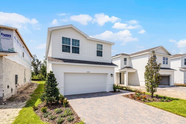 Building Photo - Brand-New 4BR Home with Tile Floors & Quar...