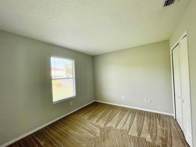 Building Photo - Cute 4/2 EAST Orlando Home in Wedgefield!