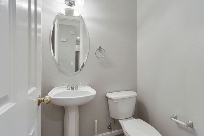 Building Photo - COMING SOON - Great 4 level end unit TH in...