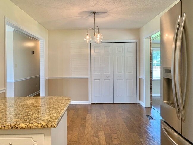 Building Photo - Charming Updated Home, Quiet Street Near Base, Fenced Yard!