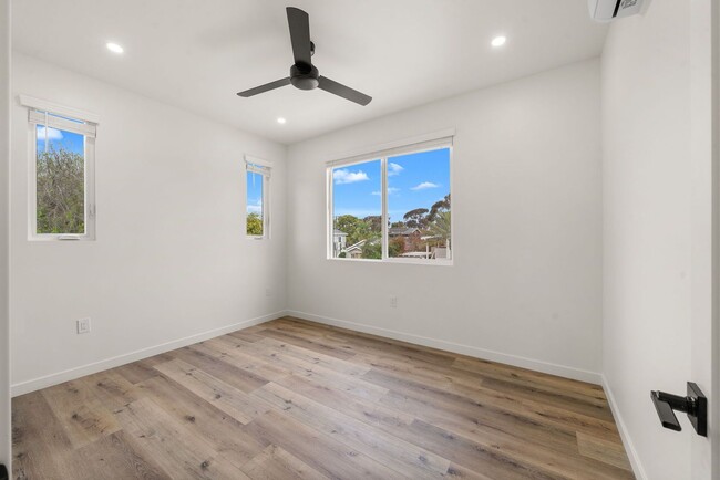 Building Photo - Introducing a stunning newly constructed t...
