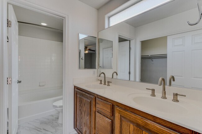 Building Photo - Gated Townhome with Strip Views from the Balcony!