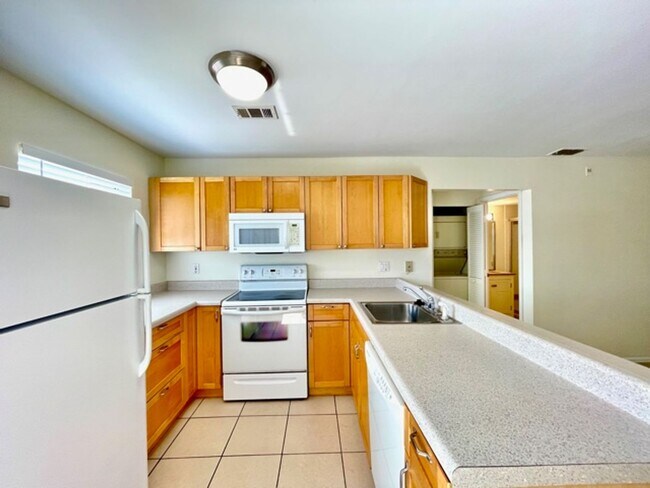 Building Photo - CENTRALLY LOCATED- UPDATED UNFURNISHED ANNUAL RENTAL