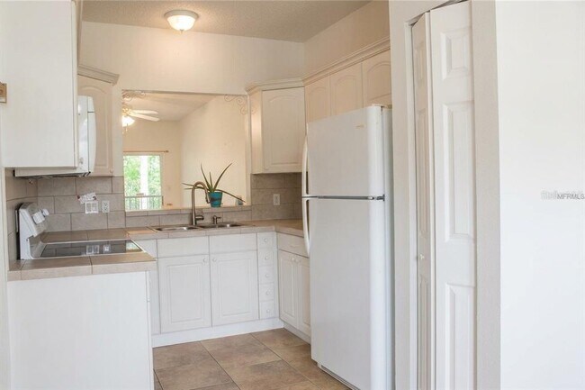 Building Photo - 8829 Coral Palms Ct